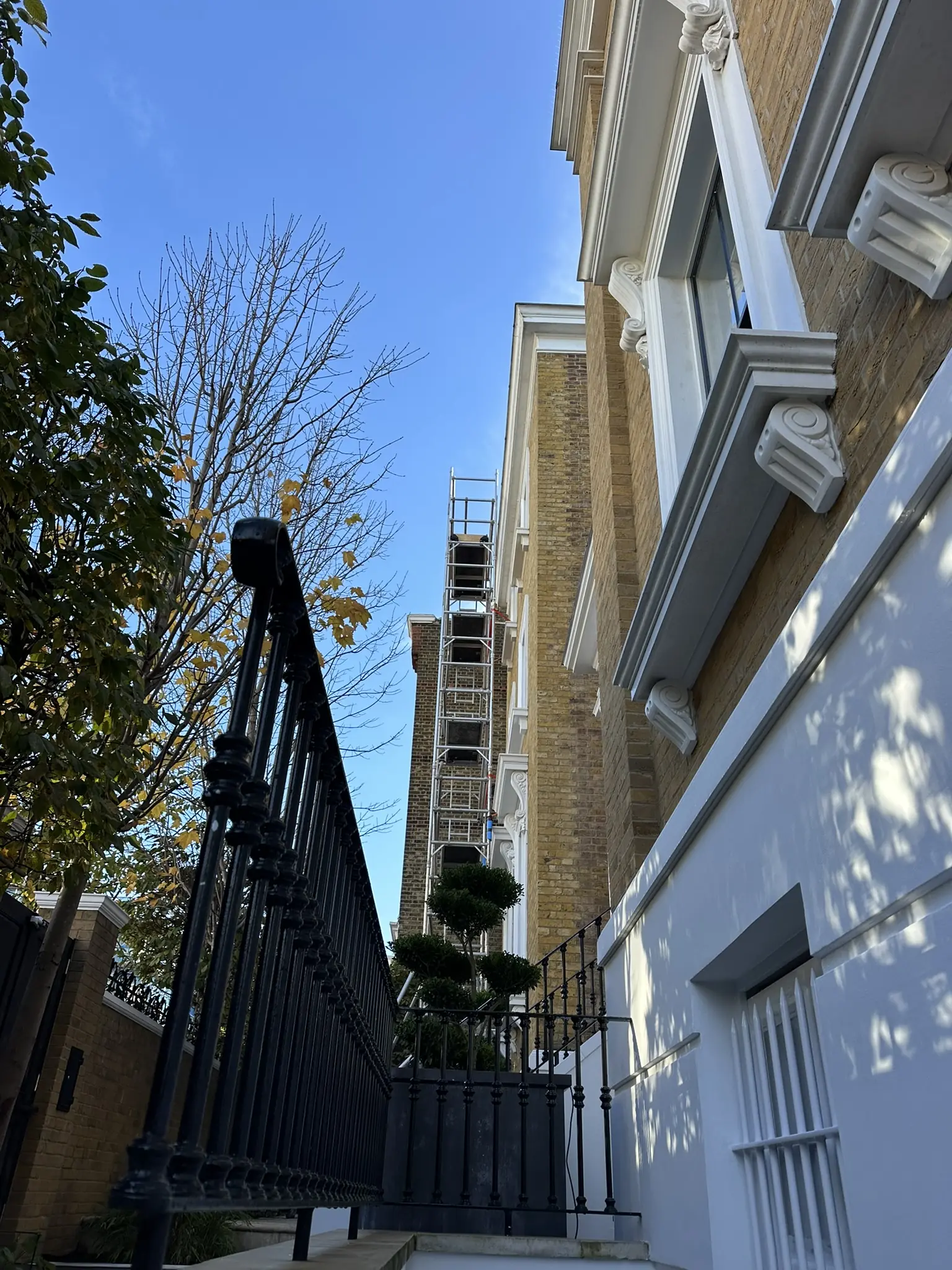plastering team working on a luxury building in London